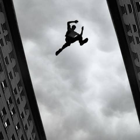transition-man-jumping-over-building